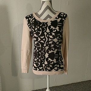 Black and tan sweater.